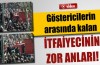 Göstericilerin arasında kalan itfaiyecinin zor anları