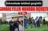 Üniversiteside sandalyeler havada uçuştu