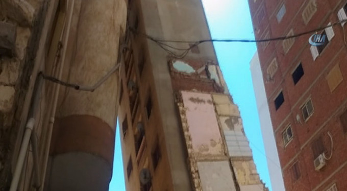 15 katlı bina böyle yan yattı! Korku dolu anlar