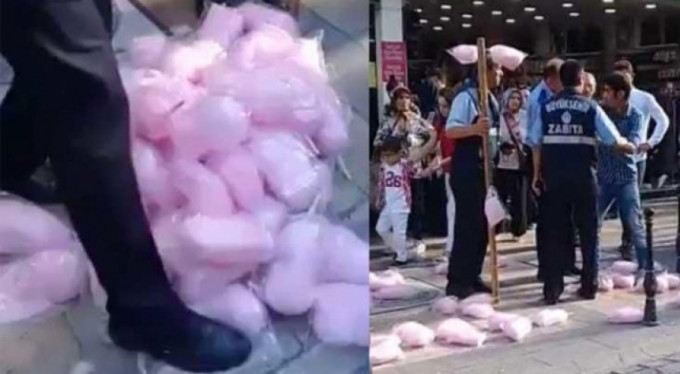 El koyduğu pamuk şekerleri çiğneyen zabıta memuru görevden alındı