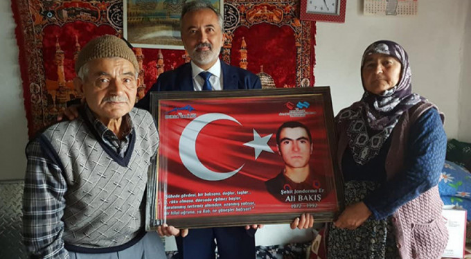 Şehit ailelerine anlamlı ziyaret