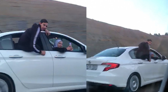 Otomobilin camında tehlikeli yolculuk!
