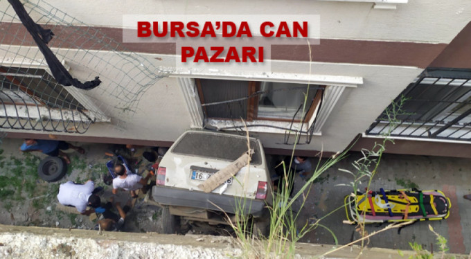 Bursa'da can pazarı... Araç duvarda asılı kaldı