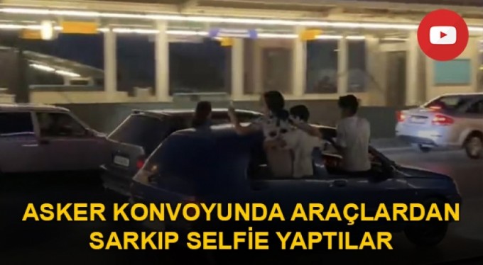 Asker konvoyunda araçlardan sarkıp selfie yaptılar