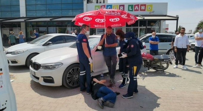 Bursa'da yaralılara şemsiyeli yardım