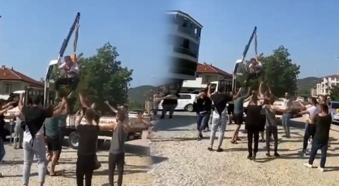 Bursa'dan bir ilginç gelenek daha! Damadı vinçte sallandırıp...