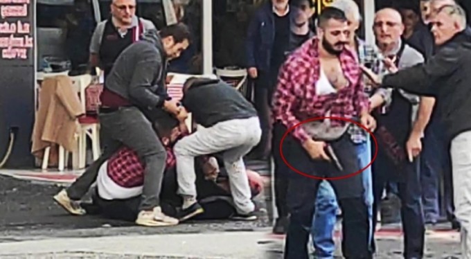 Bursa'da korku dolu anlar! Sopalı, baltalı, silahlı kavga kamerada