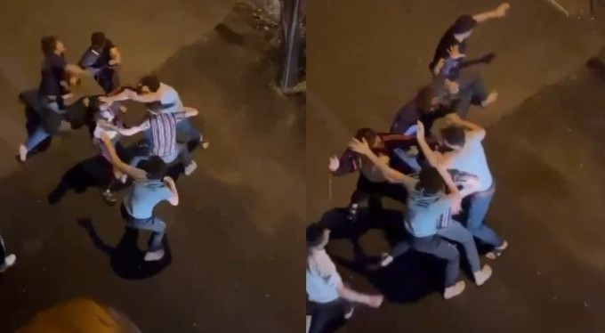 Bursa'da akrabalar sokak ortasında sopalarla birbirine girdi!