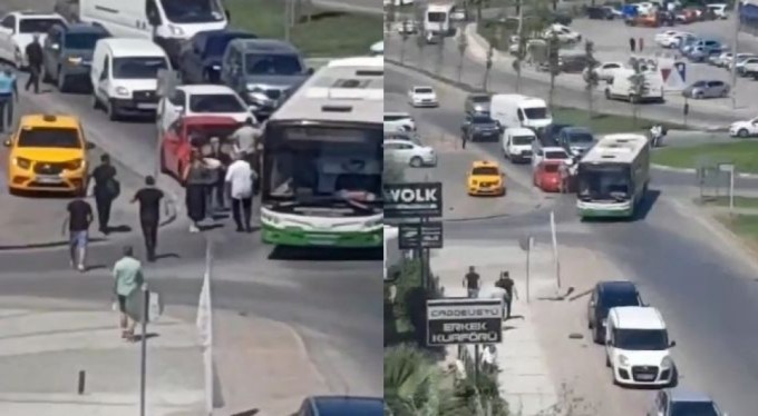 Bursa'da otobüs ile otomobil arasındaki yol kavgasında yumruklar konuştu!