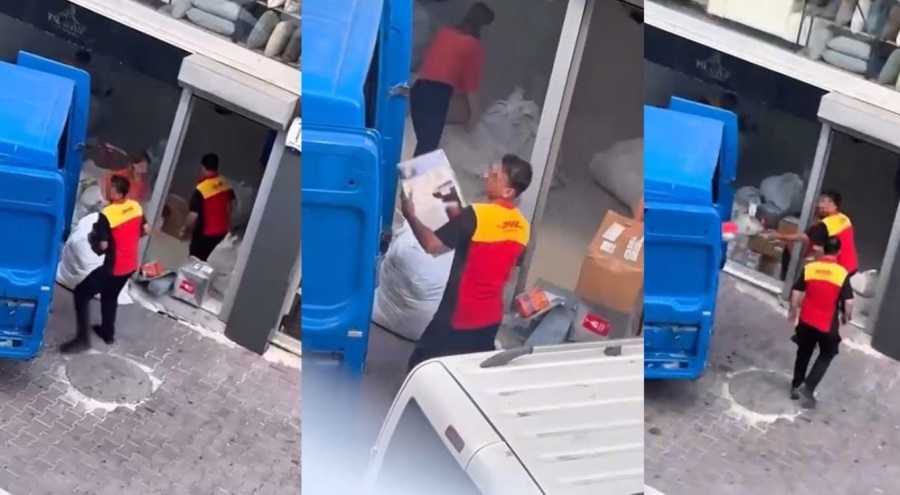 Kargo firması çalışanları kolileri kamyona fırlatarak yükledi