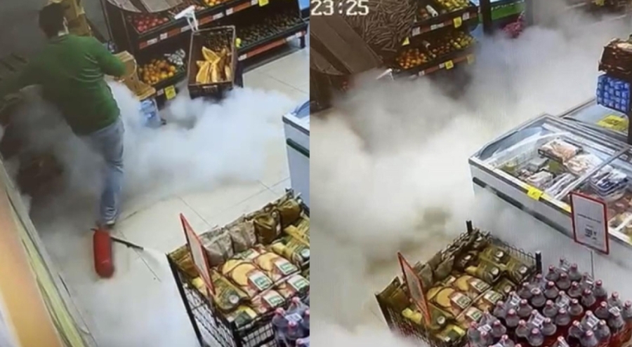 Markette yangın tüpü kazayla boşaldı: Beyaz toz bulutu kamerada