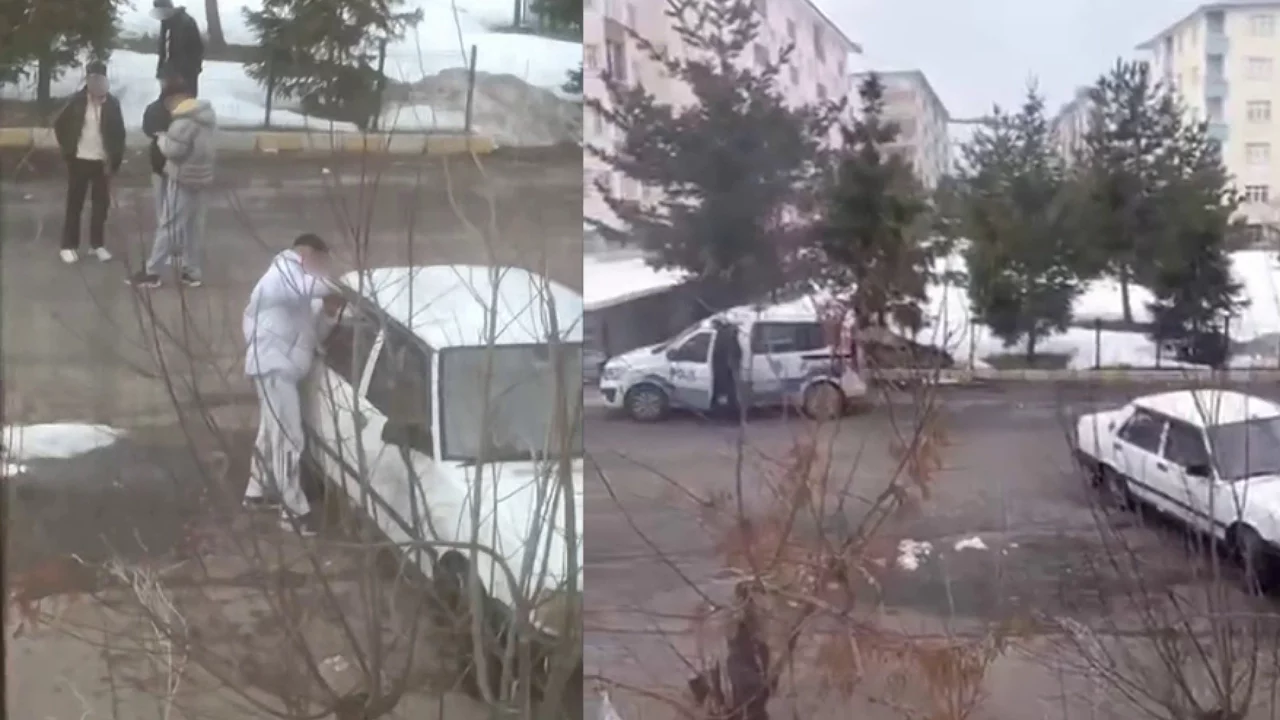 Tornavida ile otomobilin kapısını zorlayan gençler kameraya yakalandı