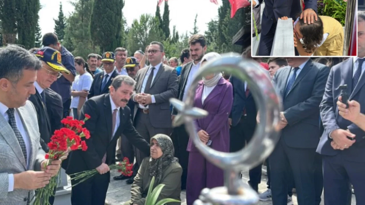 Şehitlikte yürek burkan an: Minik Elif, hiç görmediği dayısının fotoğrafını öptü
